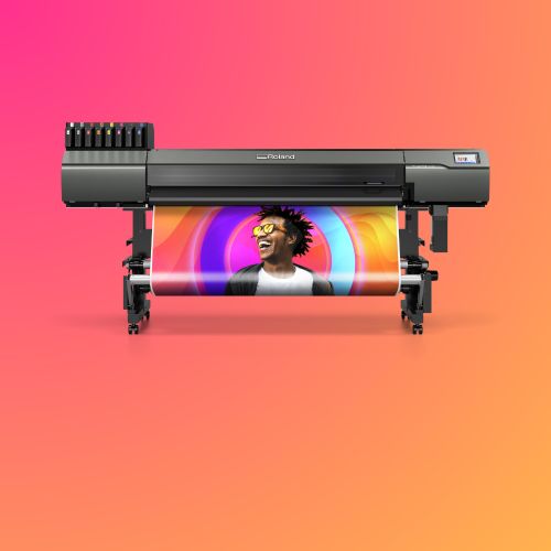 Roland wide-format printer on a gradient pink to orange background